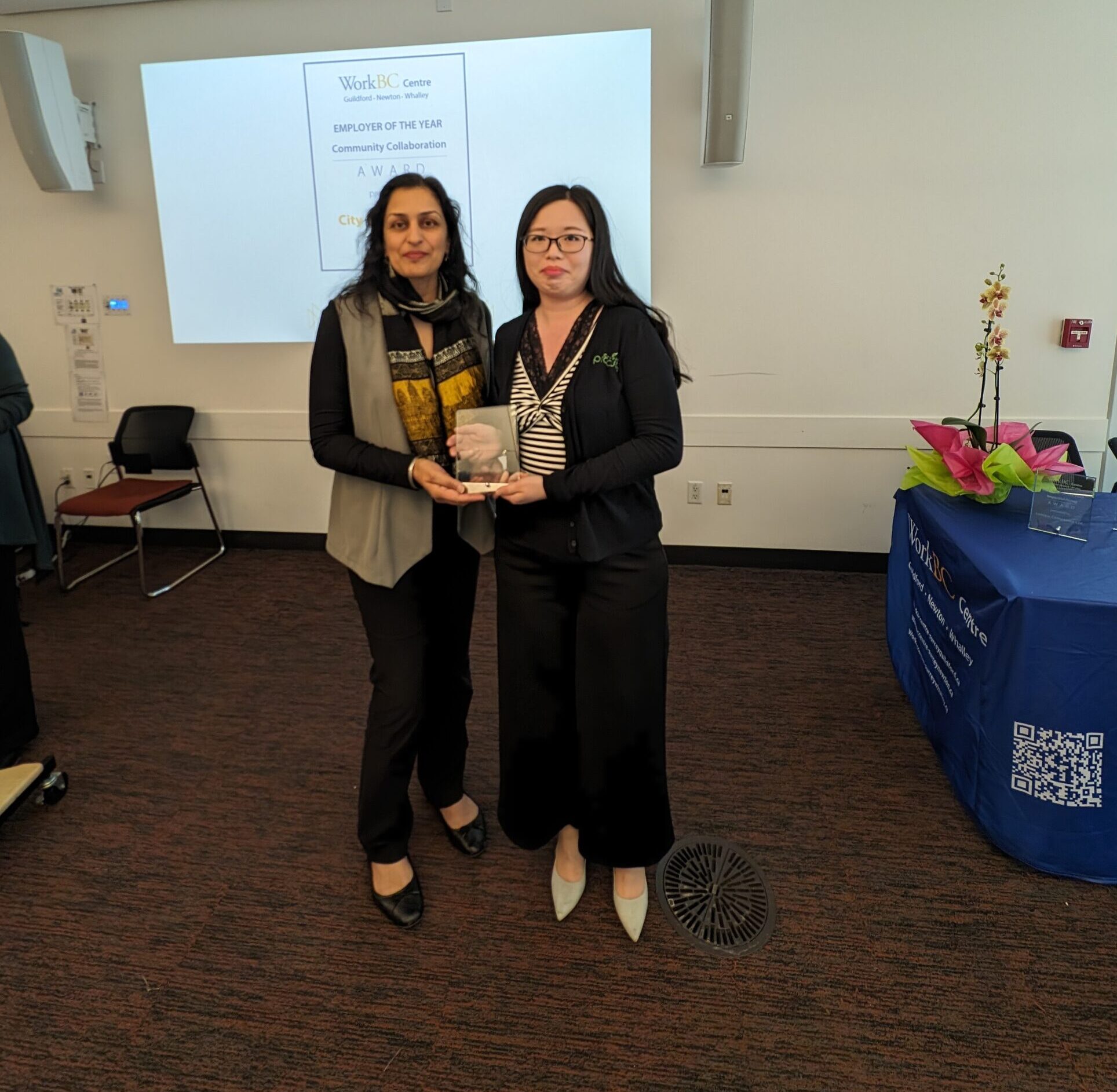 Janet accepting the award for Best Employer Award in 2024